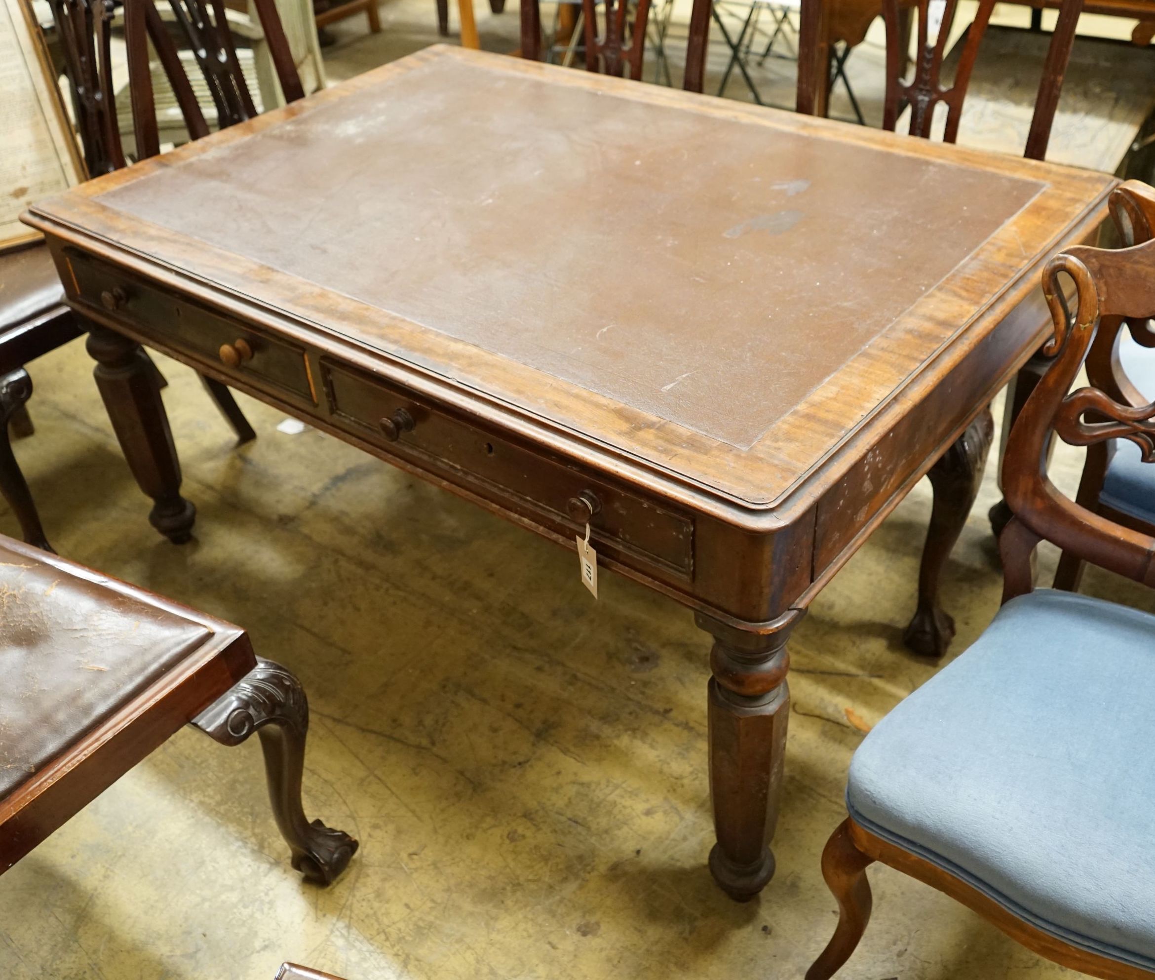 An early 19th century mahogany partner's writing table, cut down, length 136cm, width 92cm, height 66cm